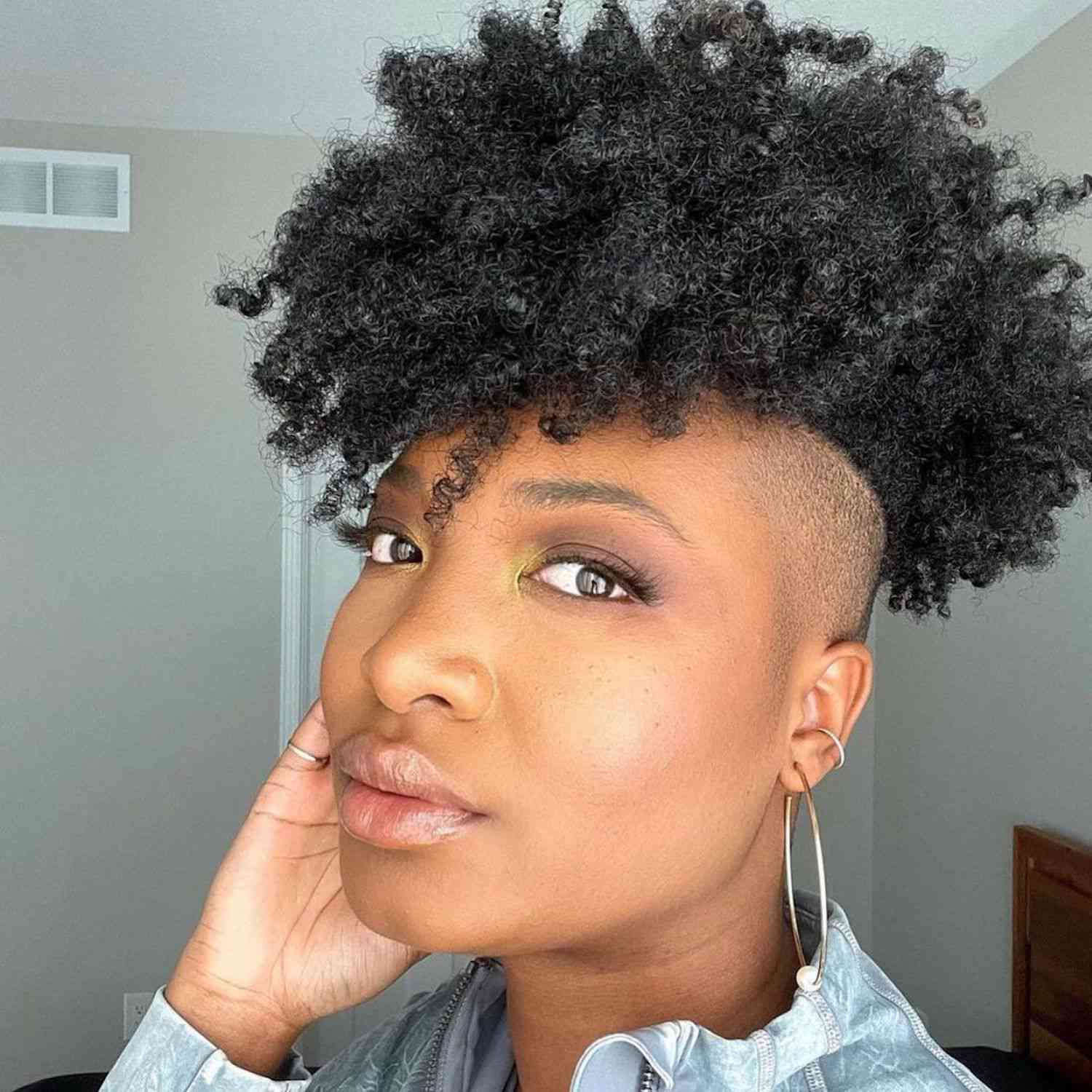 natural short haircut afro woman