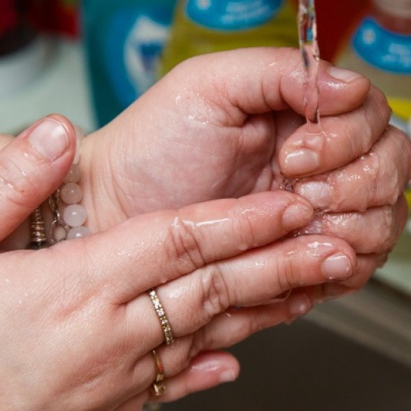 what removes nail glue from skin