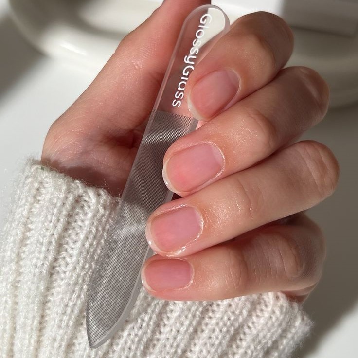 how to remove press on nail glue