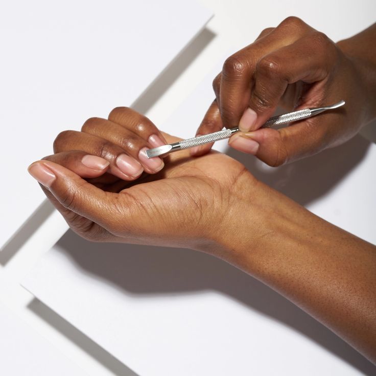 how to remove press on nail glue